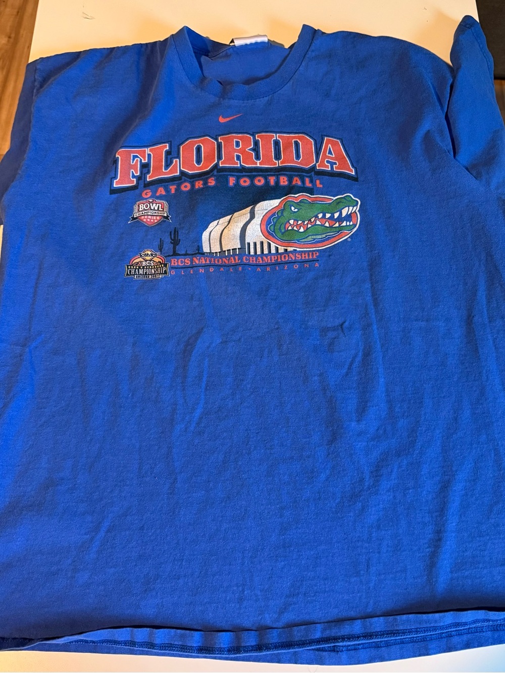 Nike Blue T‑Shirt with Orange Swoosh